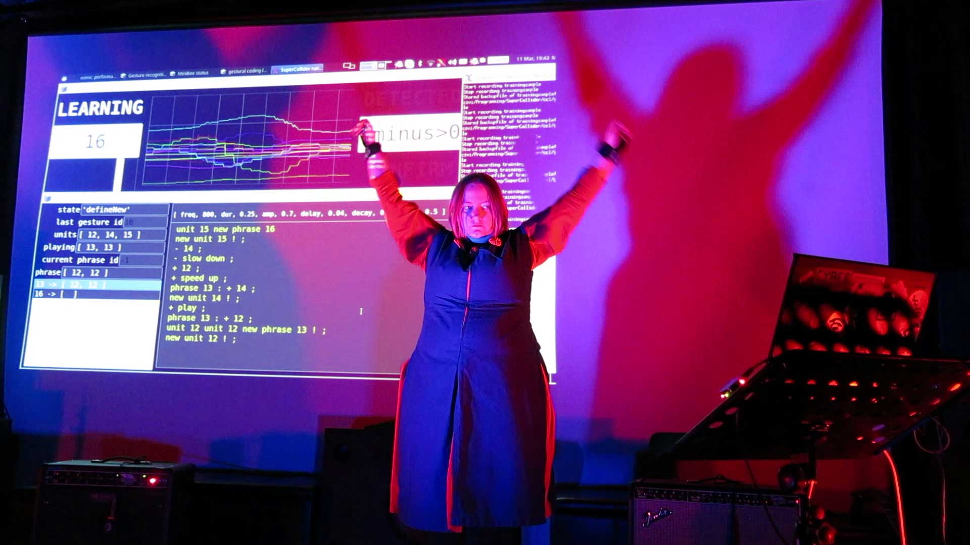  Snapshot from Marije Baalman during her performance 'The Machine is Learning' at the International Conference on Live Interfaces (ICLI) in Trondheim, March 11 2020 - a theatrical performance highlighting the process of training a machine with realtime gestures.